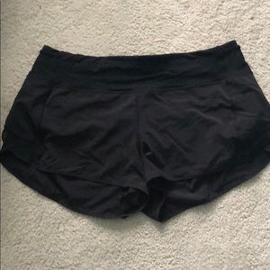 Black lululemon mesh over miles shorts